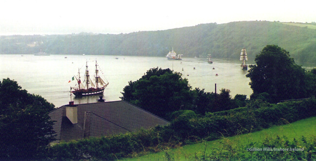 Shrouded in morning mist Le Aoife and ILV Granuaile escort Asgard II, Dunbrody and Jeanie Johnson to the start line of the 2005 Tall Ships Race off Hook Head, Co Waterford